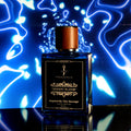 DESERT BLOOM fragrance for men, inspired by Dior Sauvage, in striking blue background, showcasing luxury perfume bottle.