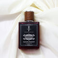 WHISPER fragrance for women inspired by Bombshell, showcasing a luxurious bottle against a light fabric background.